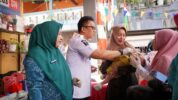 Camat Rappocini M Aminuddin Saat Menghadiri Pelaksanaan Imunisasi PIN Polio Lanjutan di Puskesmas Kassi Kassi